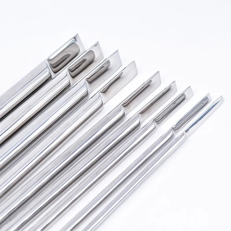 Close-up of the smooth rounded tip on a curved arc stainless steel urethral sounding dilator for controlled insertion