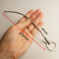 Long stainless urethral beads dilator, end section close-up showing rounded finish