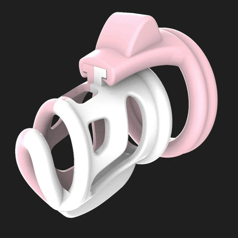 Male chastity device with contrast color vent hole 