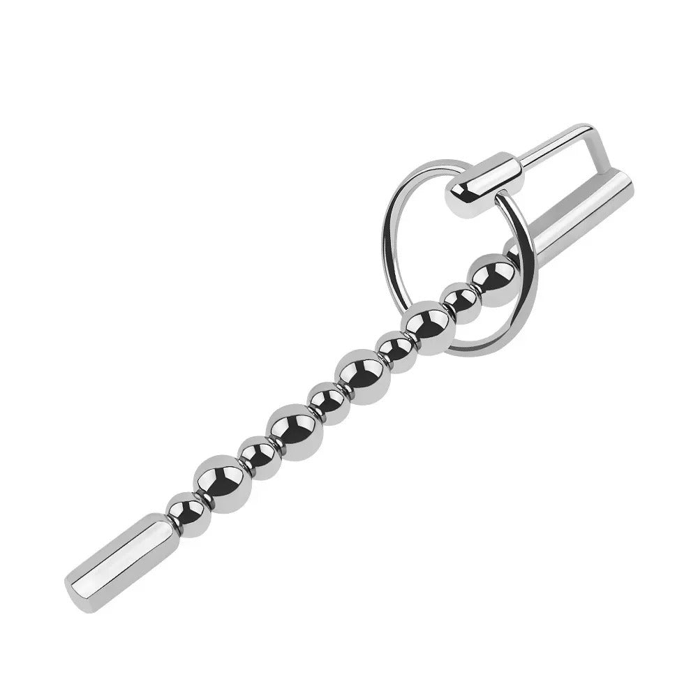 Angled studio photo of stainless steel urethral sound with beads plus cock ring, men’s BDSM chastity accessory
