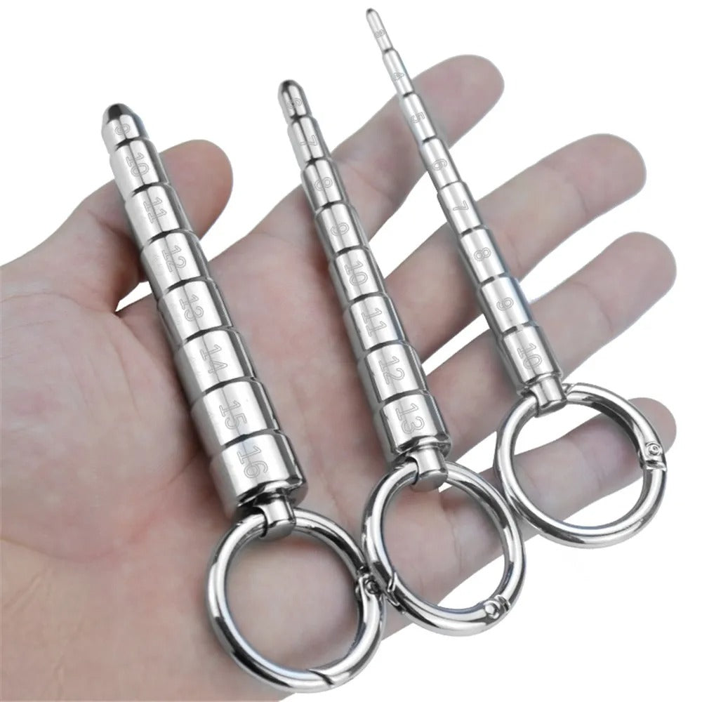 Men’s stainless steel urethral plug dilator with integrated measurement scale, full product view on clean background