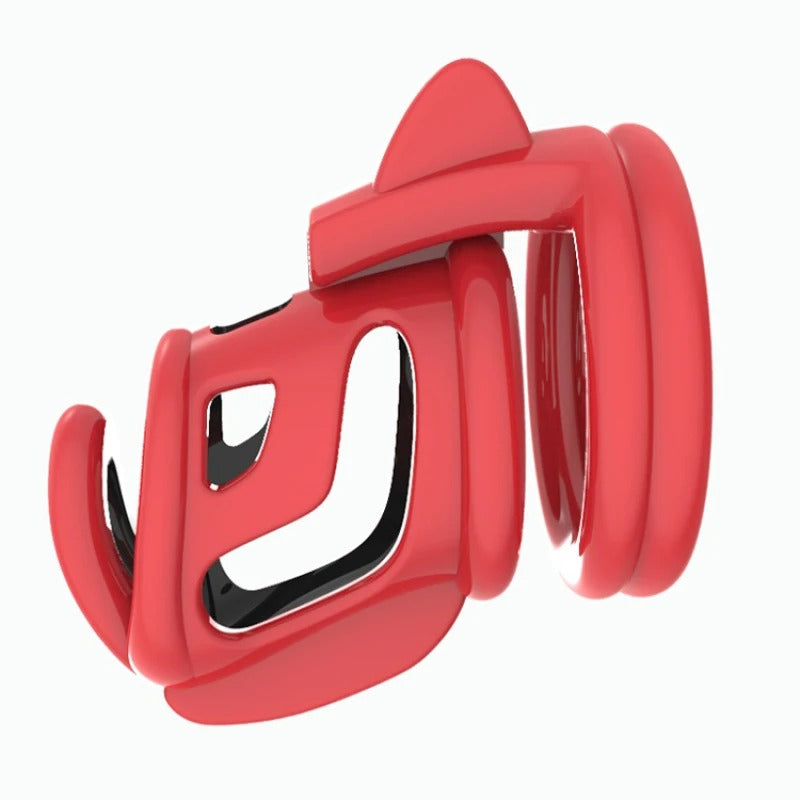 Plastic male chastity device in red and black contrast design