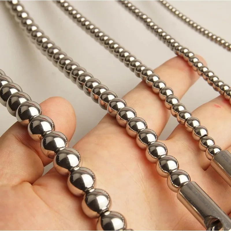 Stainless steel urethral sound with beaded profile, tip and bead detail view
