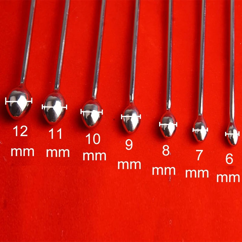 Polished stainless steel shaft detail on men’s urethral sound dilator, smooth non-porous surface