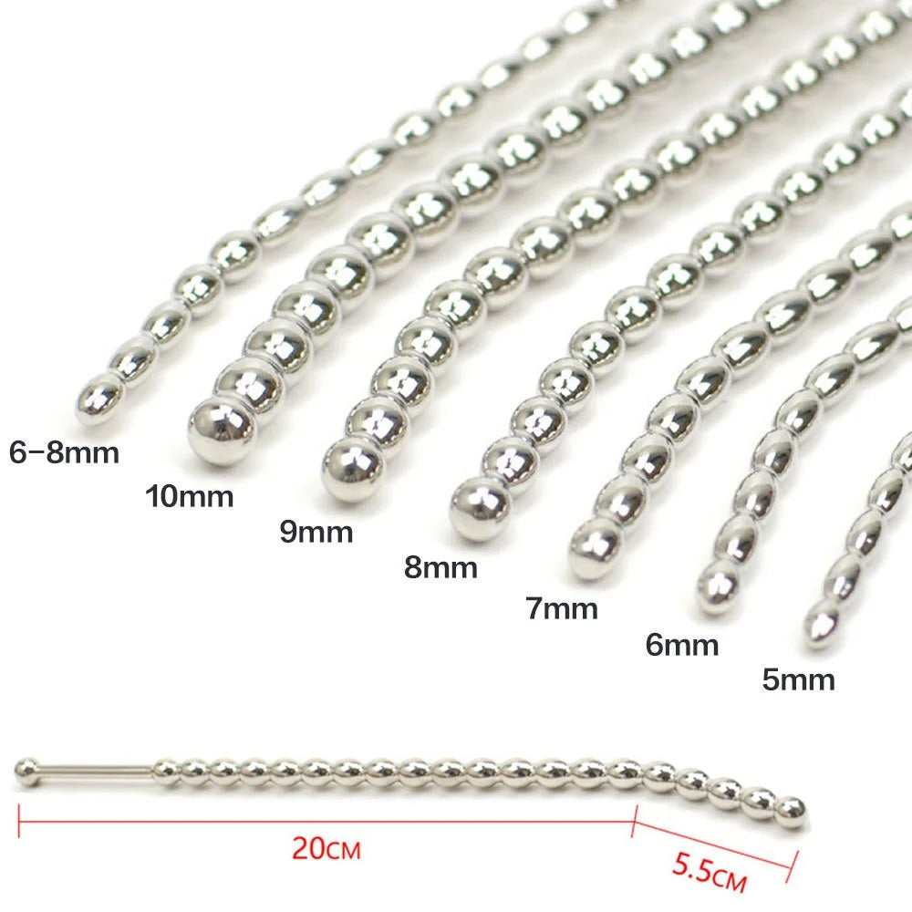 Stainless steel urethral plug beads in multiple thicknesses (5–10mm) shown together on white background