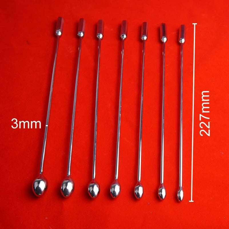 Close-up of the bullet-shaped tip on a stainless steel urethral sounding dilator for smooth insertion