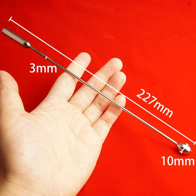 Detail from bullet tip to shaft transition on stainless steel urethral sound, smooth rounded contours